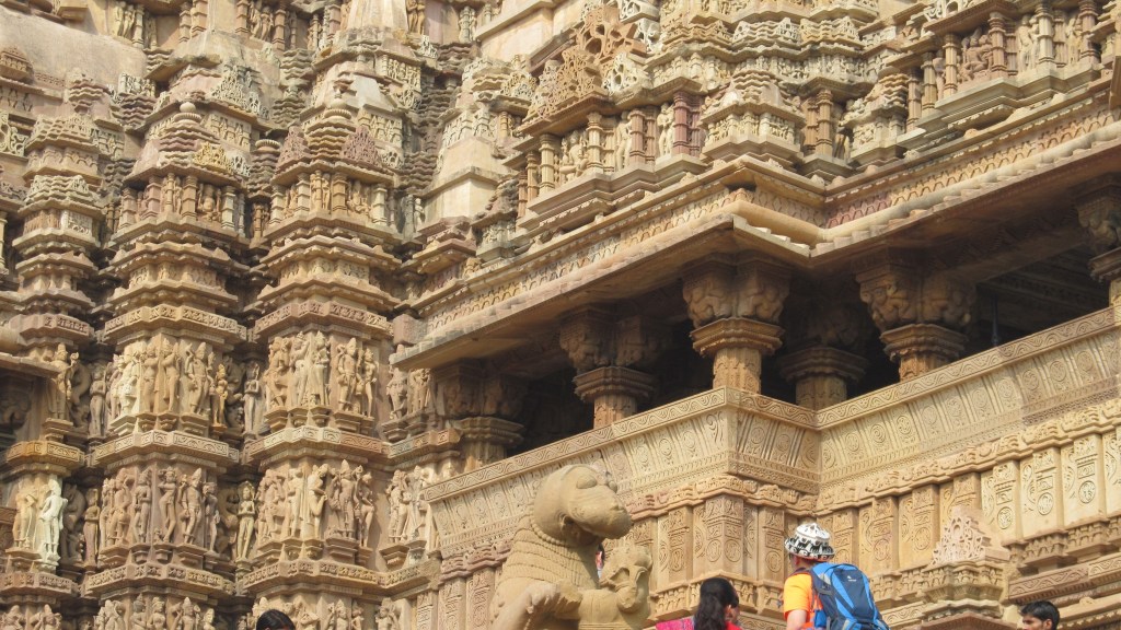 Intricate sandstone carvings on the outer walls of the temples at Khajuraho.