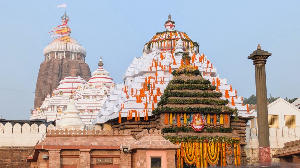 The massive scale and height of the Jagannath Temple structure in Puri, Odisha.